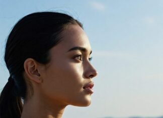 Why Daily Affirmations for Women Save My Chaotic Mornings Confident woman gazing at horizon.